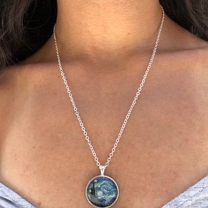 Long necklace with little painting amulet